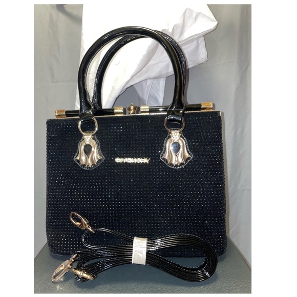 Brand new black studded purse
Size small/medium - Picture 2 of 2